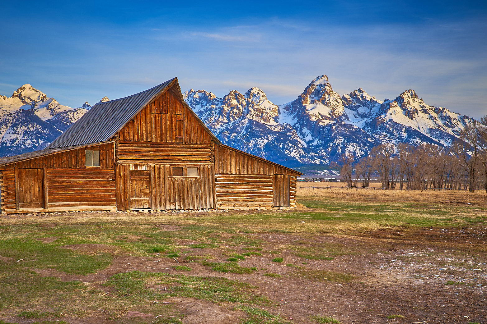 Fine art landscape photography of barn sunrise in the American West by Patrick J. Quigley