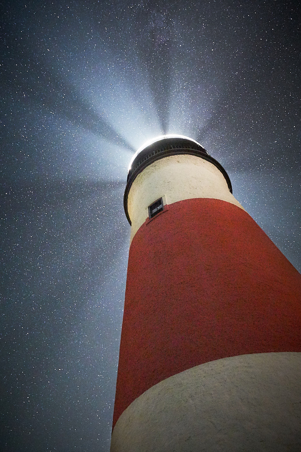 Fine art night sky photography of beams of light in Nantucket Island, Massachusetts by Patrick J. Quigley