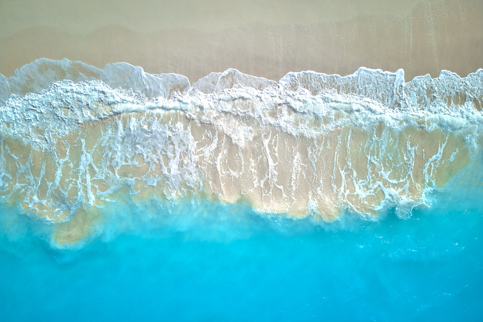 Fine art seascape photography of where land meets turquoise by Patrick J. Quigley